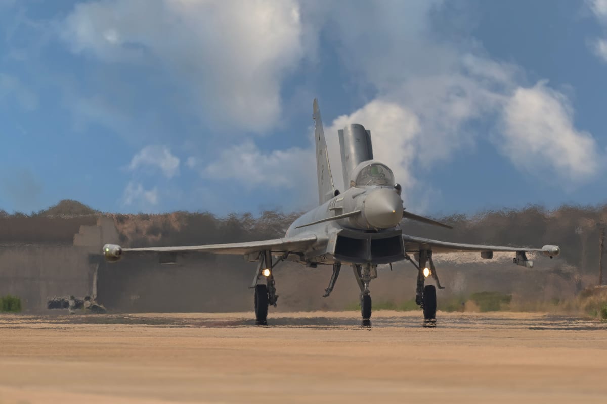 Eurofighter Typhoon jet preparing for takeoff on a sunny runway in San Javier, Murcia, Spain.