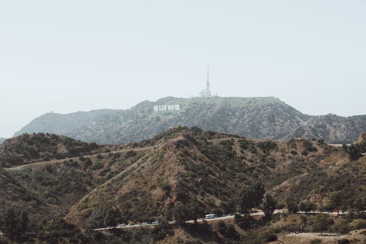 Panoramic view of the iconic Hollywood Sign nestled in the Los Angeles hills.