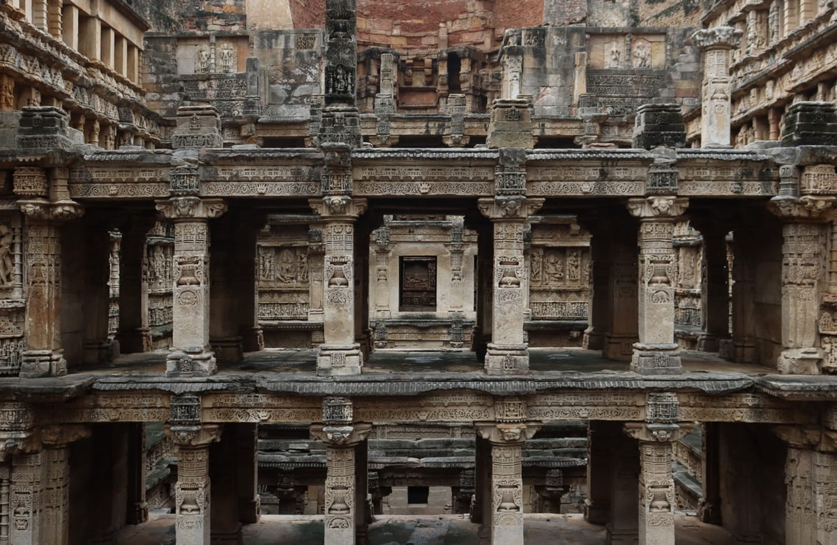 Discover the intricate stone carvings of an ancient Indian stepwell, a marvel of architectural heritage.