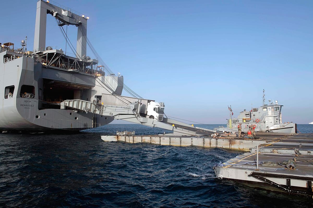 Humanitarian aid being loaded onto ship bound for Gaza — maritime aid delivery