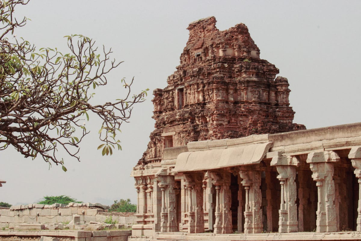 Historic stone temple ruins in Hampi showcasing ancient Indian architecture.
