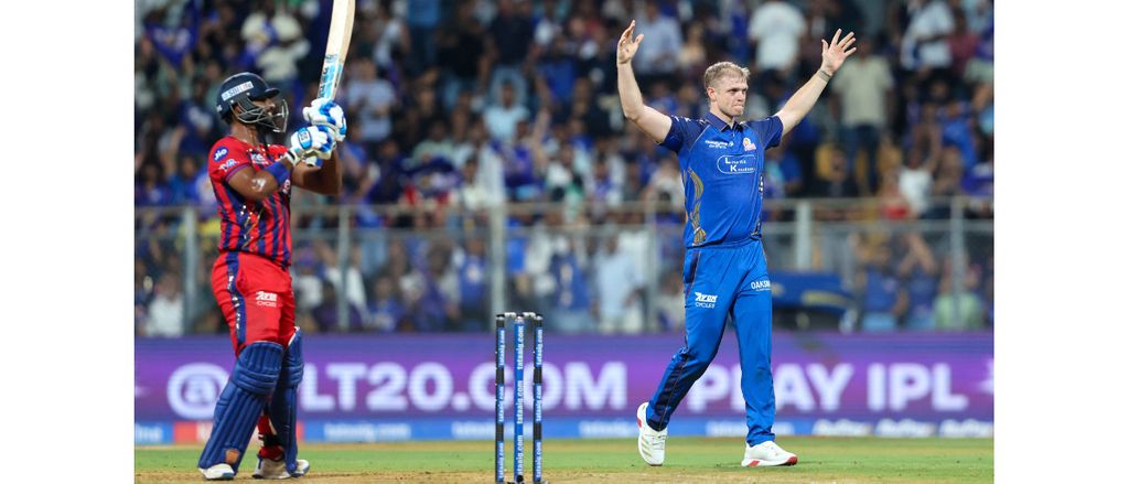 Fast bowler celebrating a wicket while the batsman looks on during TATA IPL 2026