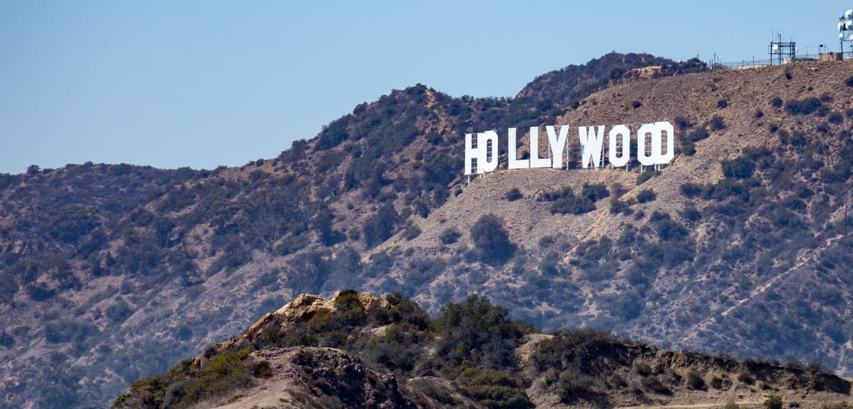 Photograph of the famous Hollywood Sign on Mount Lee, Los Angeles, offering a classic view of this iconic landmark.