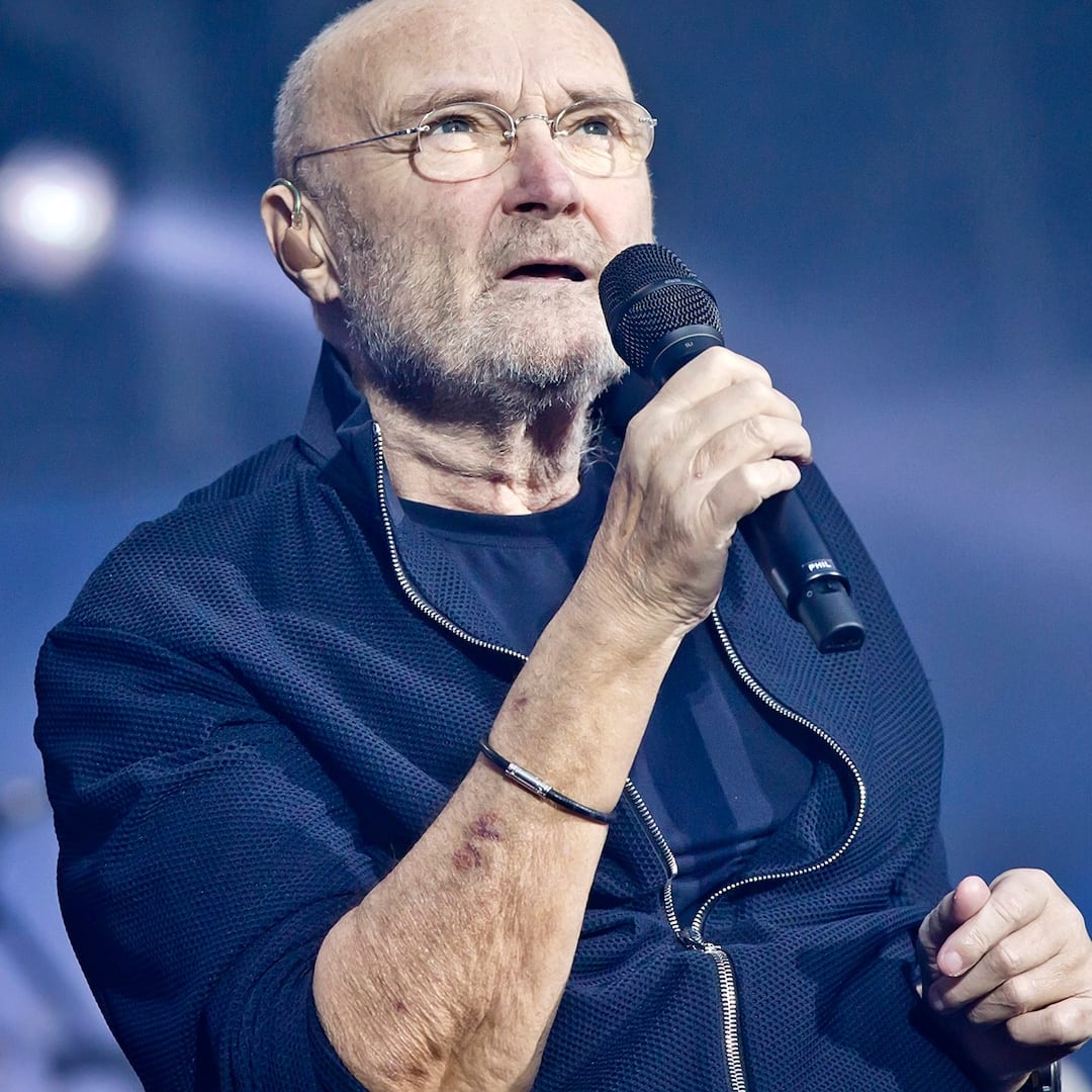 Phil Collins Steps Out With Crutches at Buckingham Palace Party